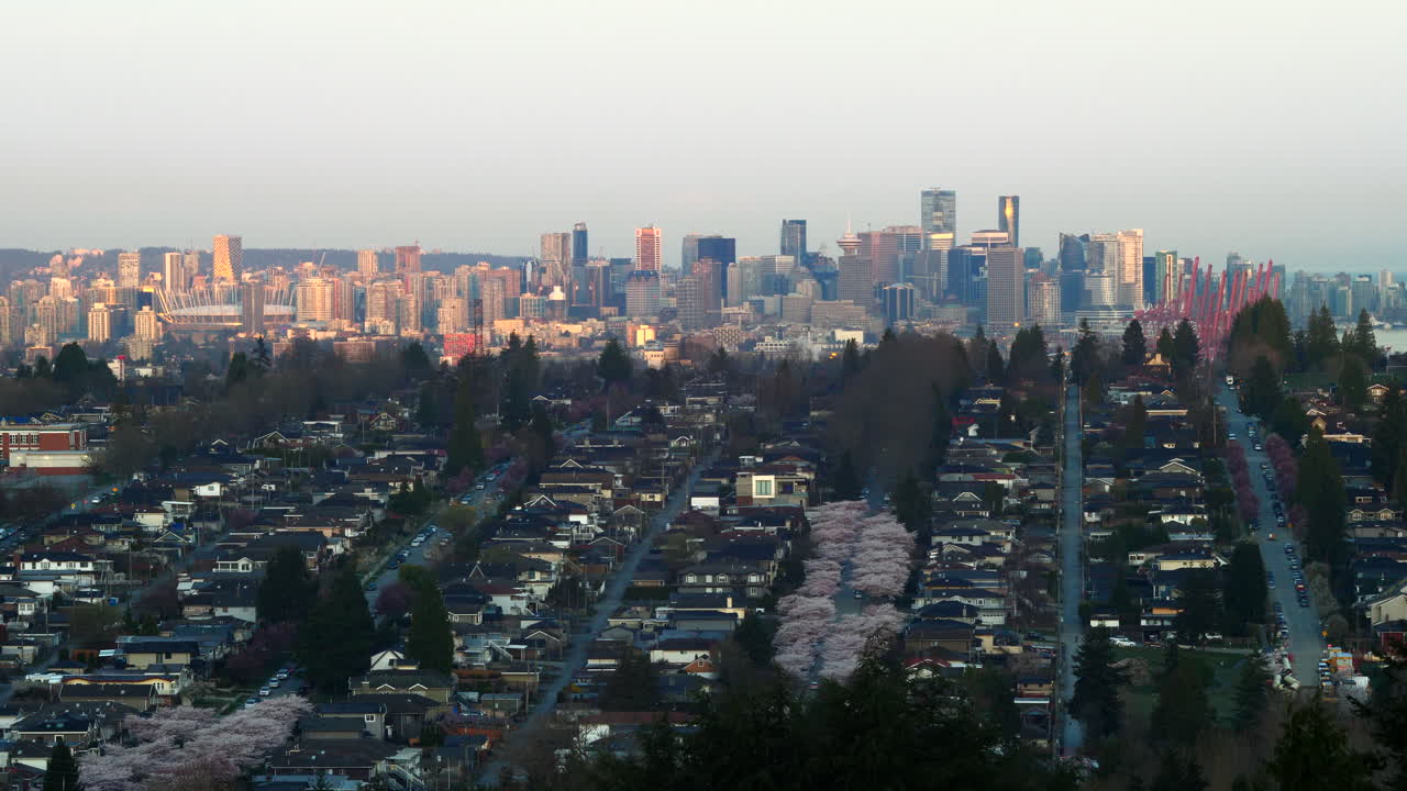 City Of Vancouver Canada Surrounded With Green Trees And Different Buildings during Sunrise.