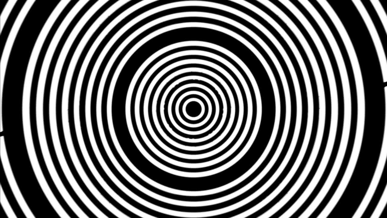 Approssimazione in una grande spirale formata da diversi cerchi su sfondo scuro.