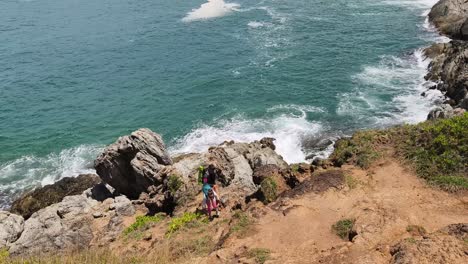 coastal hiking trail with waves and rocks