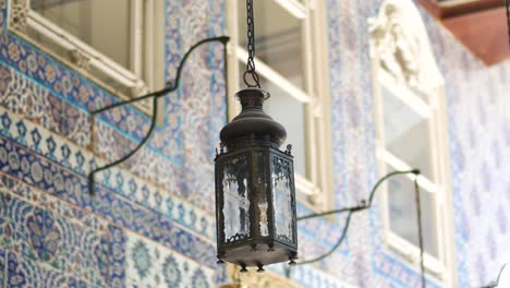 a traditional lantern hanging in a mosque