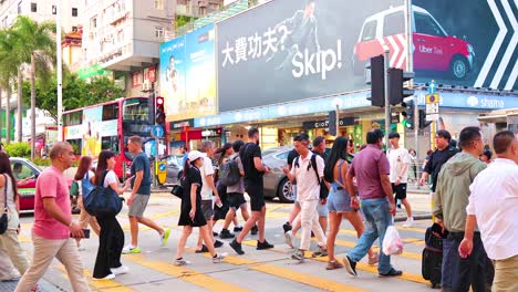 pedestrians navigate a bustling city intersection