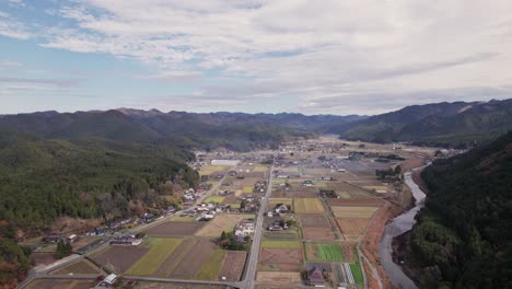 panoramic landscape of japanese agricultural fields of keihoku north kyoto rural houses, mountain valley, skyline background