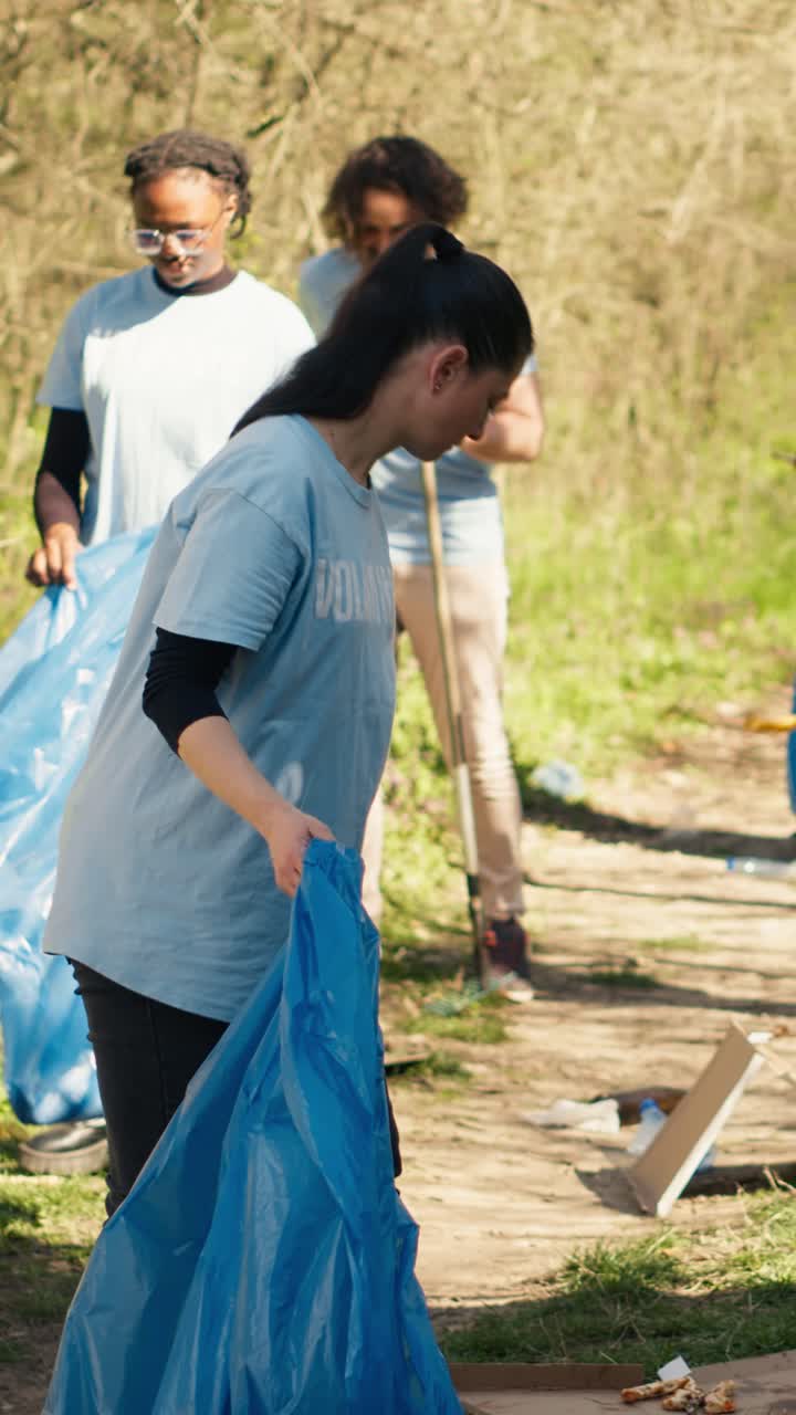 Group of Volunteers Cleaning Up Litter in a Park