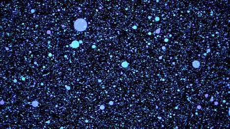 Visual-effects,-VFX,-blue-particles-on-space-on-black-background-3D-animation-camera-pan