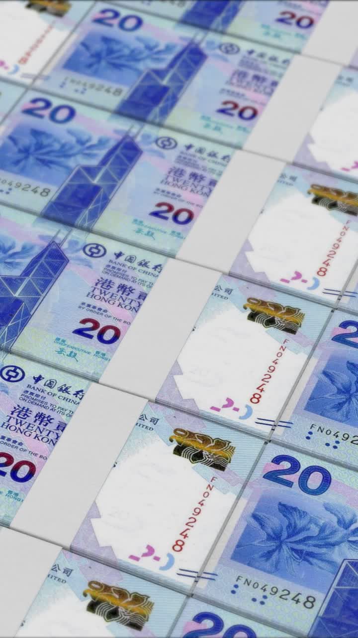 Vídeo vertical de 20 notas de DÓLAR DE HONG KONG sendo impressas por uma prensa de dinheiro