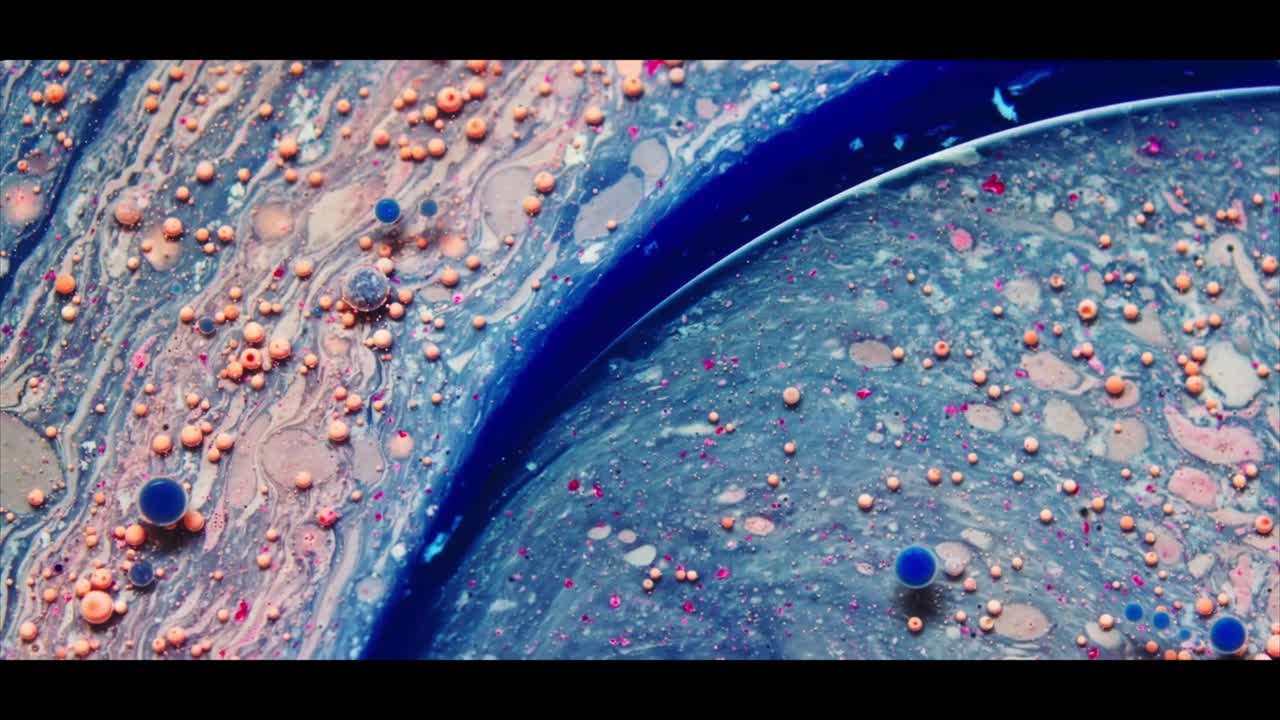 Líquido Abstrato Colorido Misturando com Bolhas e Padrões em Espiral