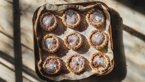 mini apple pies on baking sheet