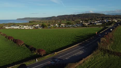 Aerial-view-vehicles-restriction-to-20-miles-per-hour-speed-limit-in-rural-farming-countryside