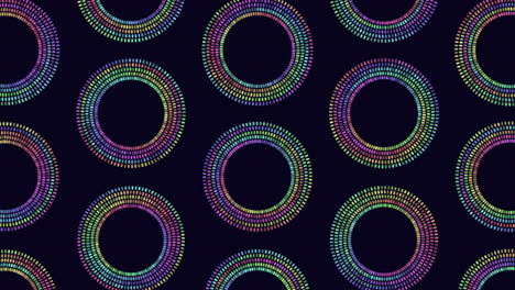 Neon-circles-pattern-with-rainbow-dots-on-black-gradient