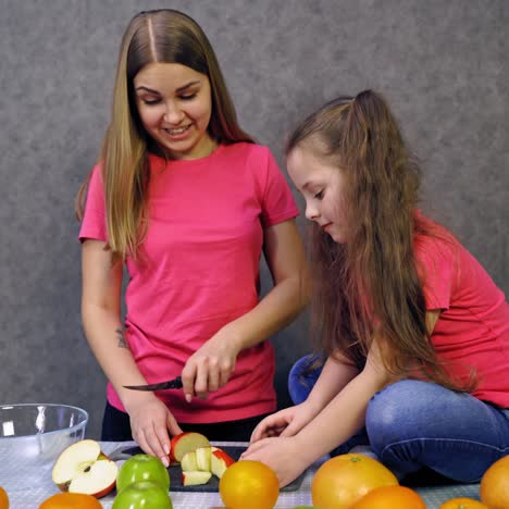girl making fruit salad