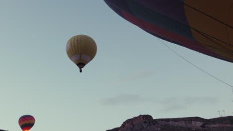 hot air balloons over cappadocia at sunrise