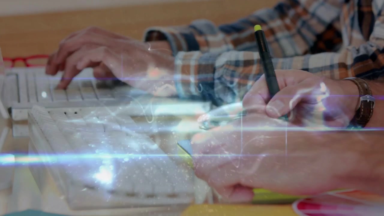 Vertical video: Bringing stylus, two hands switching keyboard and pad for work, plaid shirt