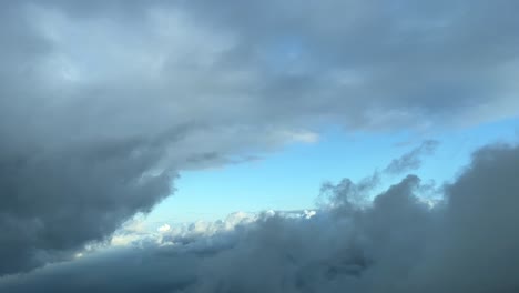 flying toward a gap between the clouds