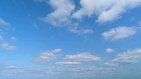 white clouds background. blue sky with copyspace background. time lapse.