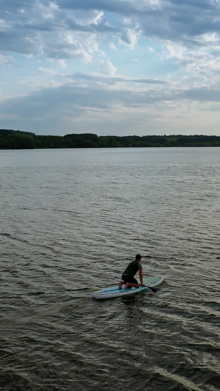 Two stand up paddlers enjoying vacation