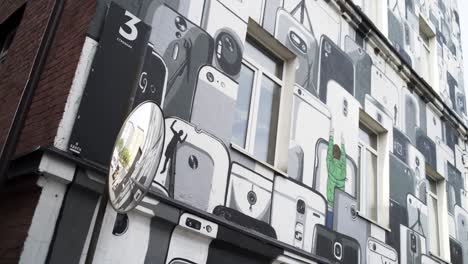 street art mural of phones on building