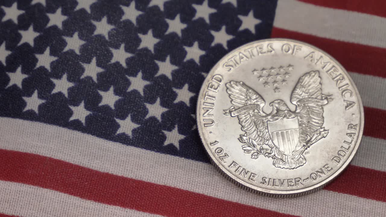 Silver dollar and american flag Cash money banknotes and coins. Finance and investment concept. Closeup shot. Currency exchange of one hundred usd. Rich business economy of usa