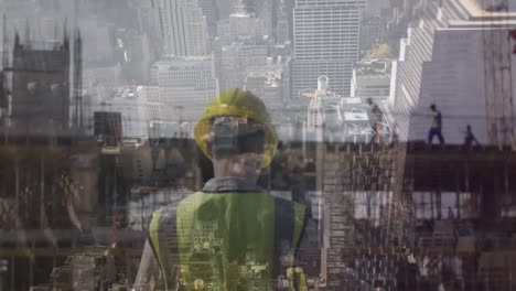 construction worker looking at building plans