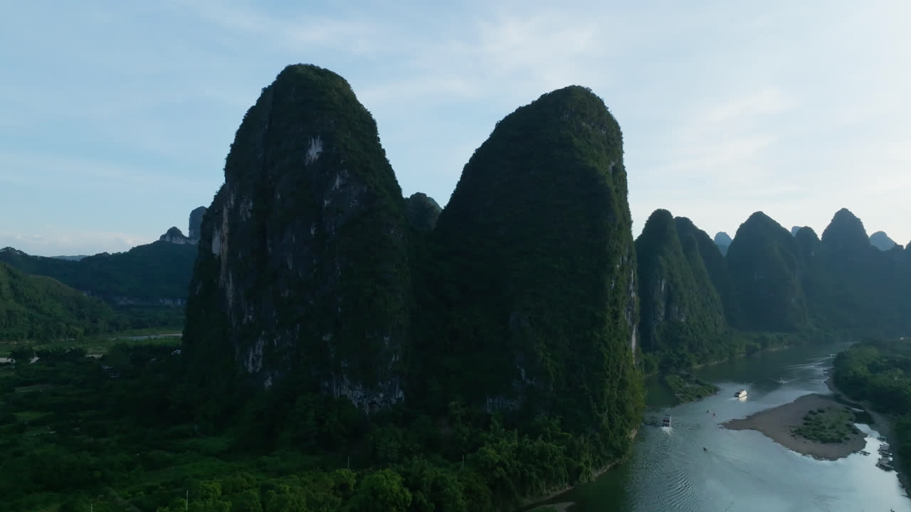 Aerial view in front of the Yuanbao Mountains, summer evening in Xingping, China