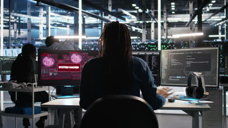 panicked engineer in ai server facility reacts to hacking incident
