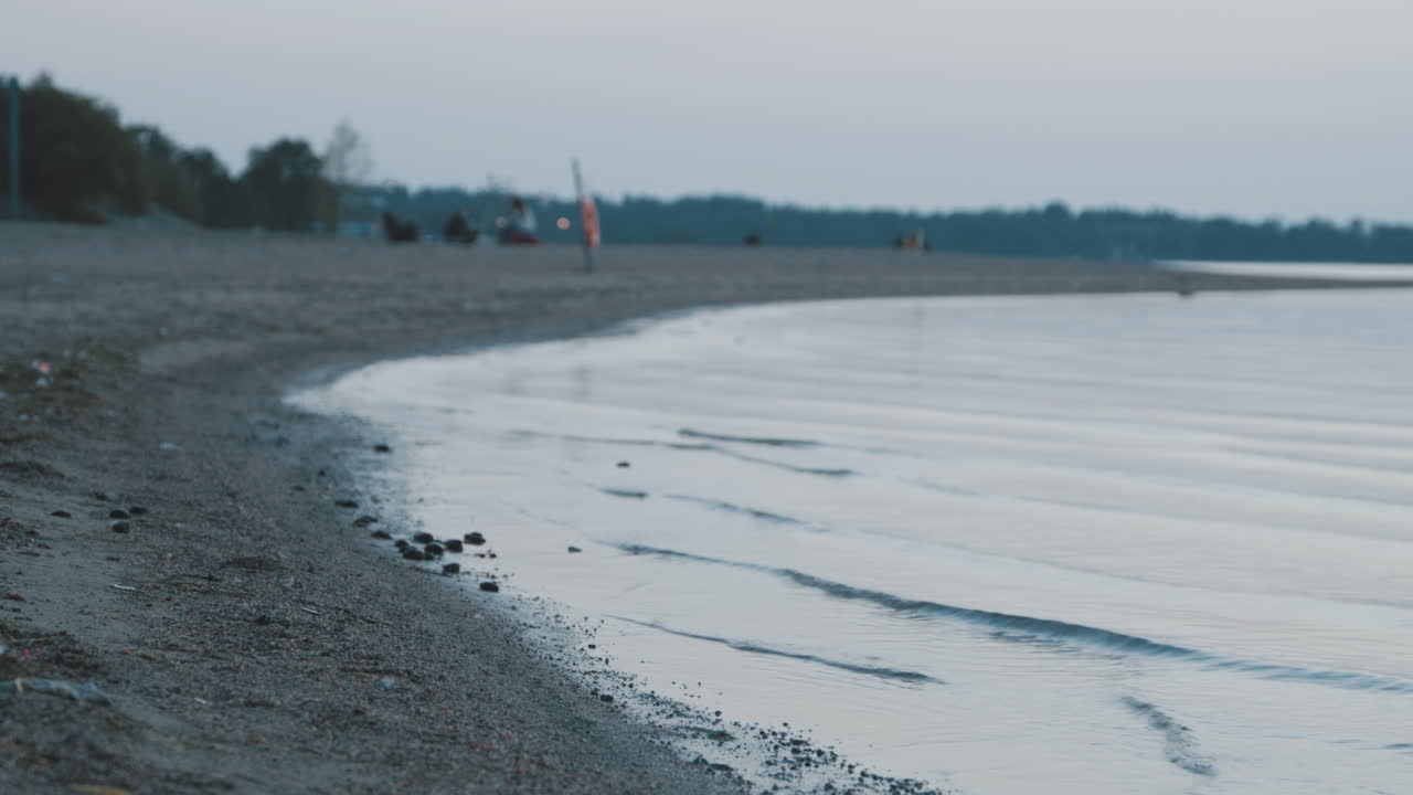 People in Twilight in Helsinki at Hietaranta Beach