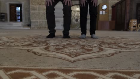 old man and child praying