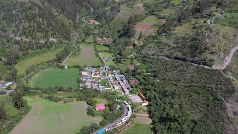 traffic-up-highway-in-Valley-Apurimac,-Peru-Moving-out-Drone-UHD