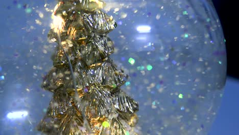 Snow-Globe-with-Golden-Christmas-Tree