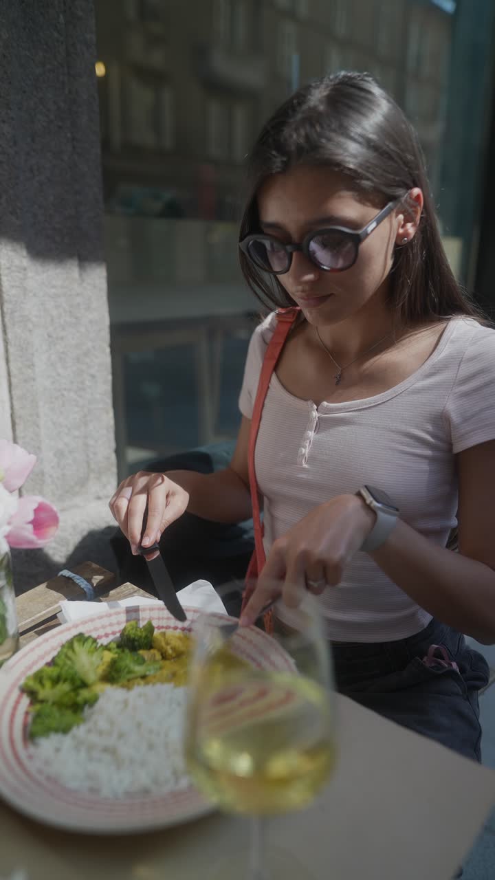 Woman enjoying lunch at a cafe