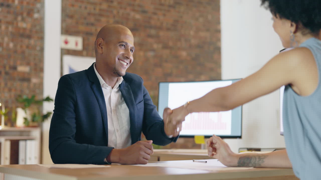 Handshake, happy business people