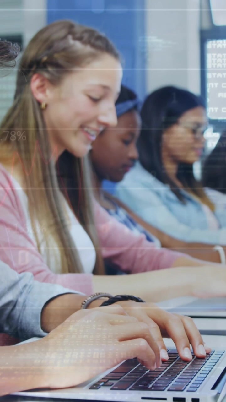 Animation of data processing against group of diverse students using laptop at school