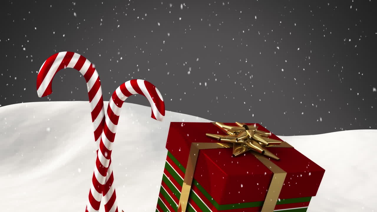 animación de la nieve cayendo sobre los dulces de navidad y presente