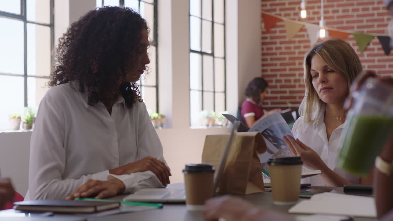 multi ethnic business women meeting brainstorming sharing creative ideas for startup project in modern office workplace