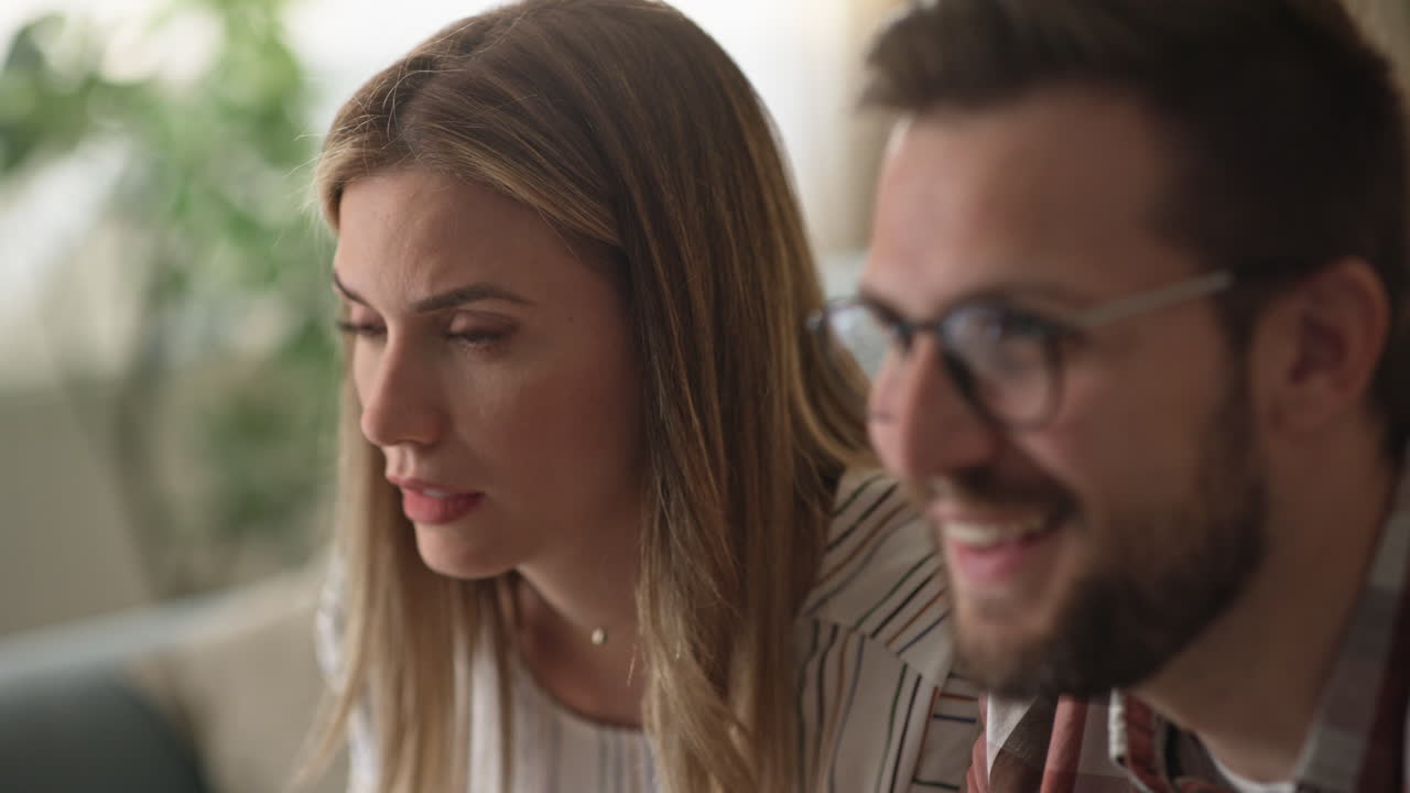 Couple talking indoors
