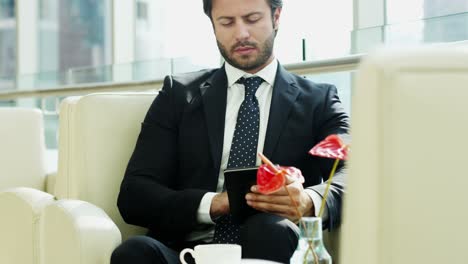 portrait middle eastern business traveller wireless cloud device