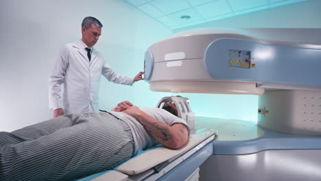 doctor performing mri scan on a patient