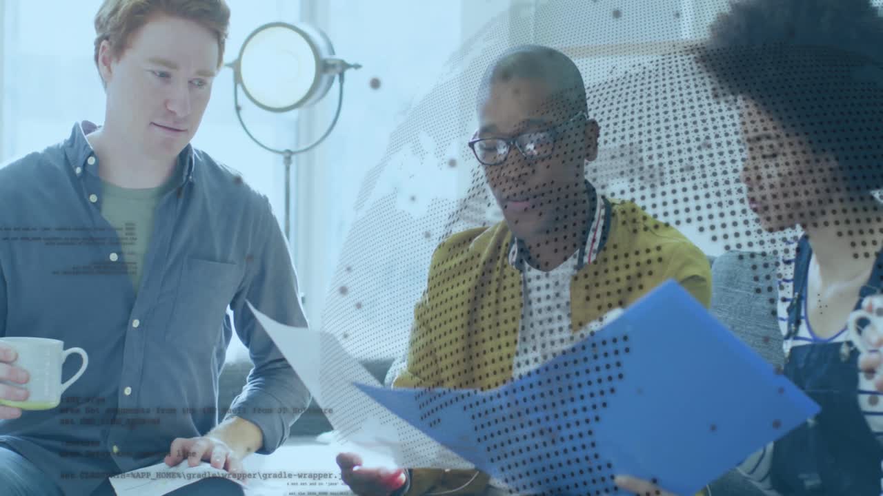 Animation of globe over diverse business people in office