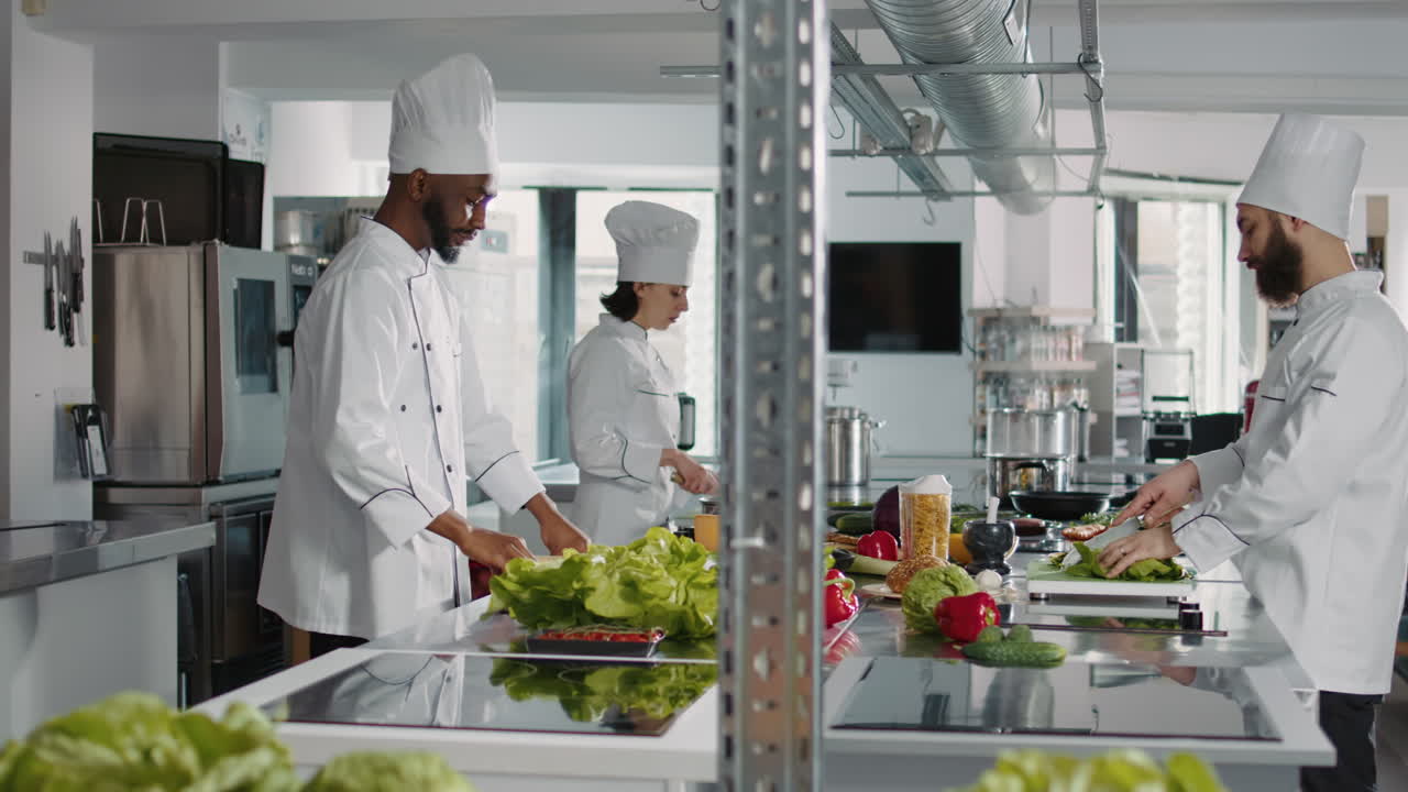 Portrait of confident chef sitting in restaurant kitchen to cook