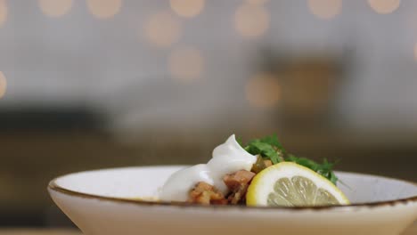 preparing a soup with sour cream and lemon