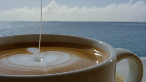 latte art with an ocean view