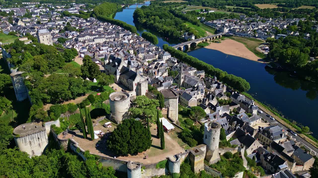 Chinon town and Royal Fortress, Vienne River with bridge and castle, Loire Valley, France. Aerial forward