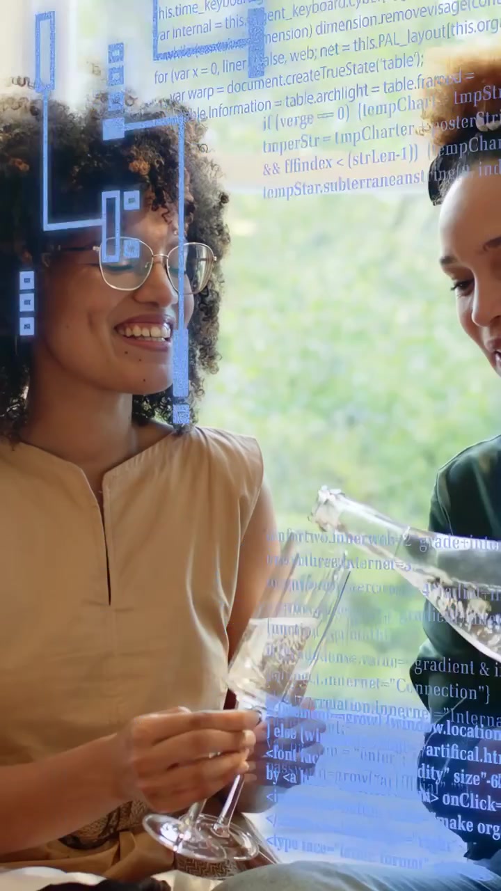 Vertical video: Right woman tipping bottle pouring in glass as tech overlay rising friends toasting