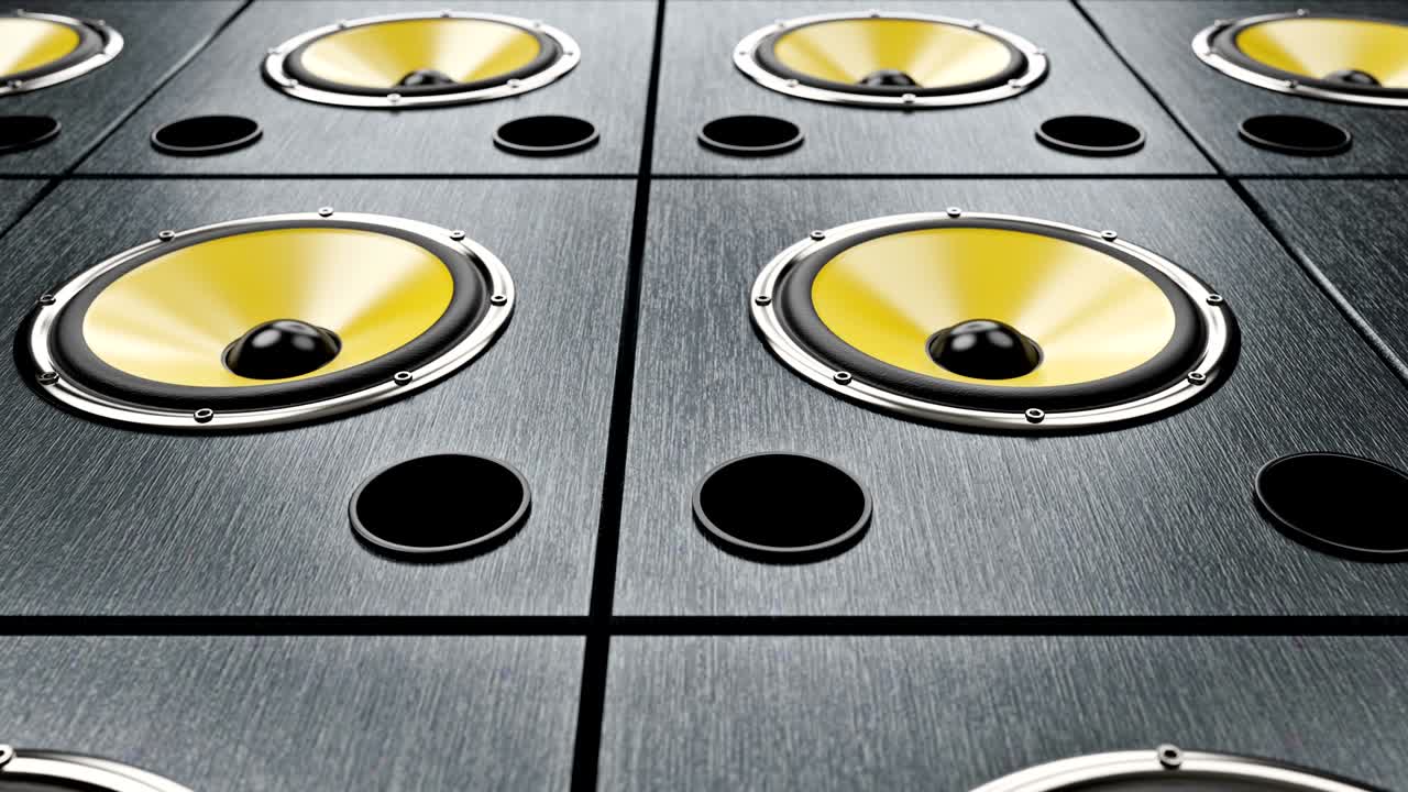 현대 음악을 연주하는 노란색 막을 가진 오디오 스피커 위에 대각선으로 이동