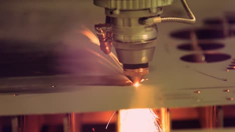 CNC-Laser-cutting-of-metal,-modern-industrial-technology.