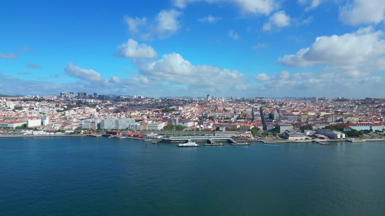 Aerial view from the Tejo river to Lisbon cityscape center at Cais do Sodre terminal boat. Portugal