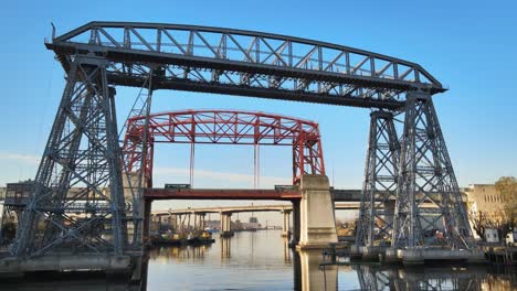 close static view of puente transbordador and red bridge, buenos aires