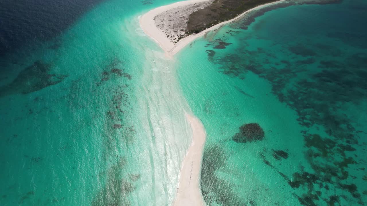 Aerial View of a Tropical Island with Turquoise Water and White Sand Beaches