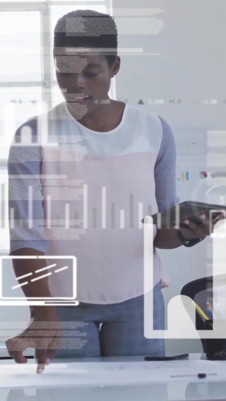Animation of data processing and diagrams over diverse businesswomen talking in office