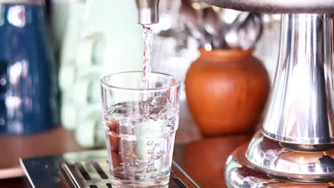 water being poured into a glass