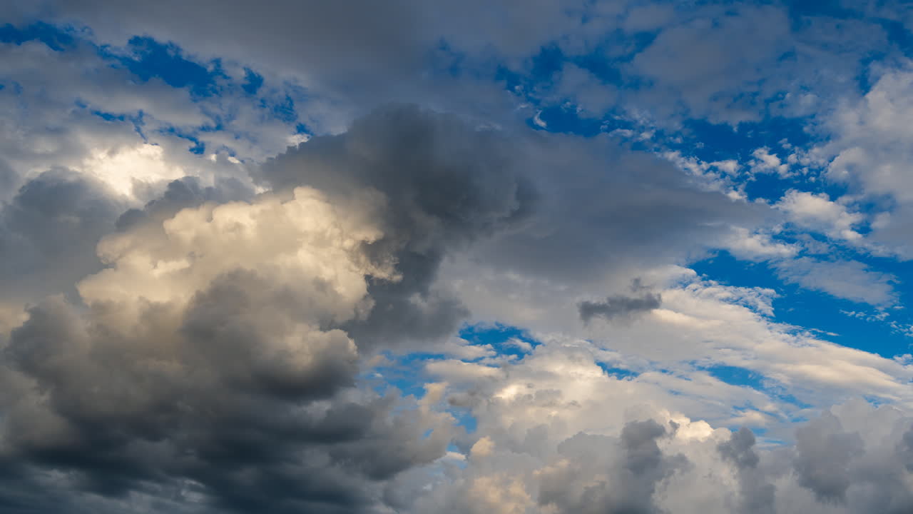 Powerful storm clouds in motion across the sky creating a dramatic visual rhythm